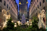 Kerstkaart: De engelen blazen op de trompet op Rockefeller square