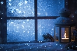 Kerstkaart: Een waxinelichtje voor het bevroren venster