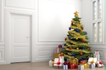 Kerstkaart: Kerstboom waar cadeautjes onder liggen in een wit huis